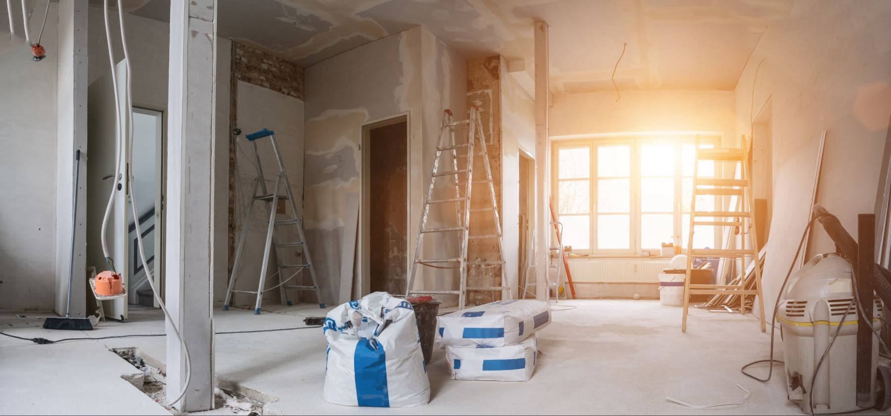 Fresh plastering material on a hawk and trowel.